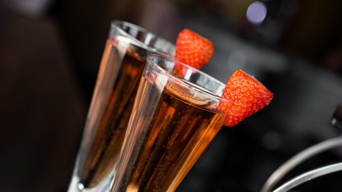 Rose prosecco served with strawberries in our champagne bar